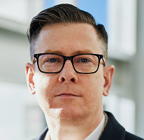 Alexander Hughes portrait of CEO and executive at a crypto trading company